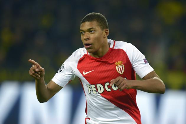 Monaco's French forward Kylian Mbappe Lottin reacts after scoring during the UEFA Champions League 1st leg quarter-final football match BVB Borussia Dortmund v Monaco in Dortmund, western Germany on April 12, 2017.
The match had been postponed after three explosions hit German football team Borussia Dortmund's bus late on April 11, 2017 ahead of a Champions League home game. / AFP PHOTO / Sascha Schuermann        (Photo credit should read SASCHA SCHUERMANN/AFP/Getty Images)