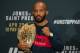 Demetrious Johnson and his constant companion: The UFC belt.