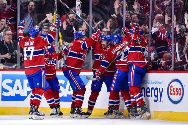 MONTREAL, QC - APRIL 14:  Tomas Plekanec #14 of the Montreal Canadiens celebrates a late third period goal with teammates against the New York Rangers in Game Two of the Eastern Conference First Round during the 2017 NHL Stanley Cup Playoffs at the Bell Centre on April 14, 2017 in Montreal, Quebec, Canada.  (Photo by Minas Panagiotakis/Getty Images)