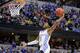 INDIANAPOLIS, IN - MARCH 19: De'Aaron Fox #0 of the Kentucky Wildcats dunks against Landry Shamet #11 of the Wichita State Shockers in the second half during the second round of the 2017 NCAA Men's Basketball Tournament at the Bankers Life Fieldhouse on March 19, 2017 in Indianapolis, Indiana. The Kentucky Wildcats won 65-62. (Photo by Andy Lyons/Getty Images)