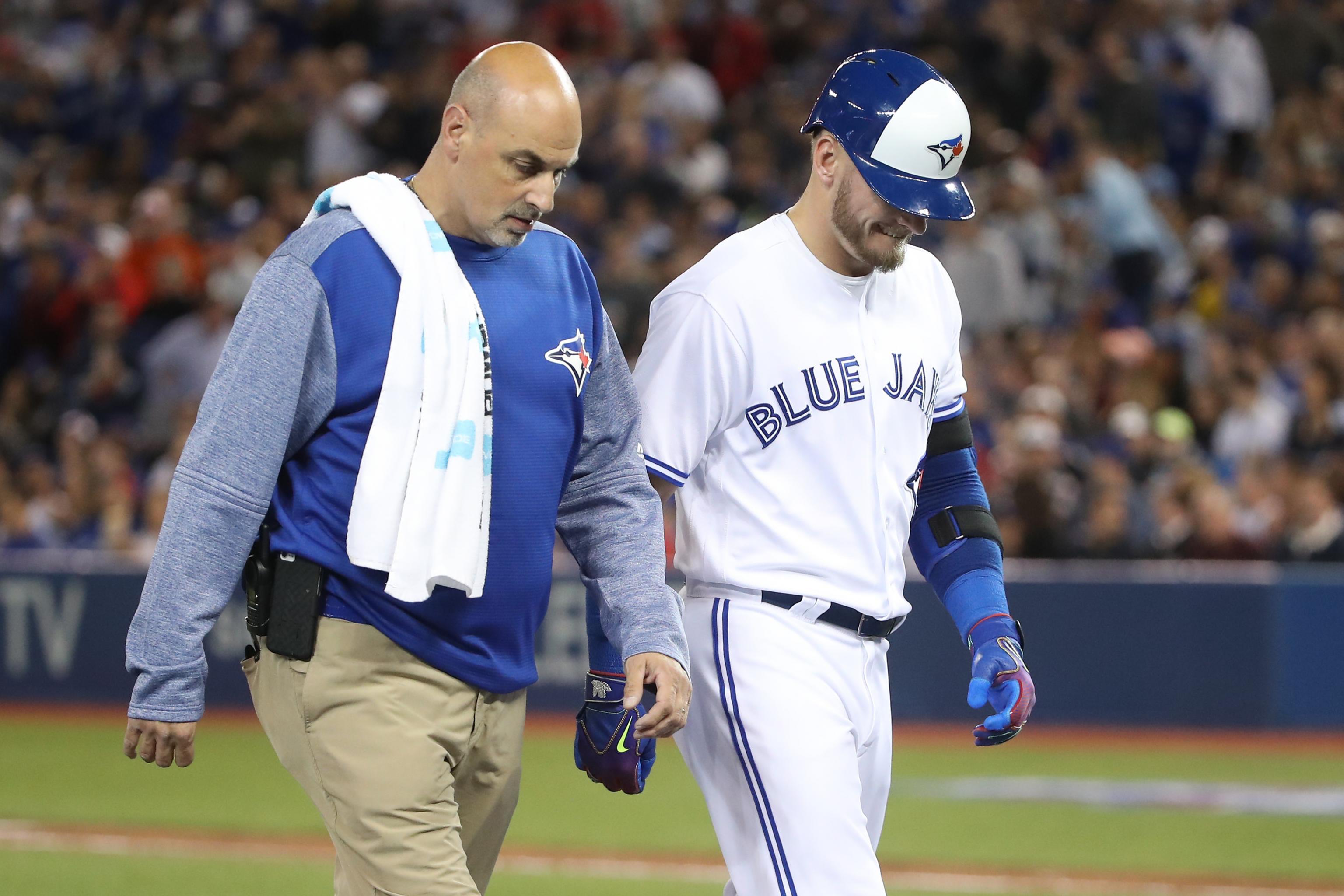 Josh Donaldson #20 of the Toronto Blue Jays reacts as he is