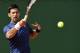 Serbia's Novak Djokovic hits a return to French's Gilles Simon during the Monte-Carlo ATP Masters Series tournament on April 18, 2017 in Monaco / AFP PHOTO / Yann COATSALIOU (Photo credit should read YANN COATSALIOU/AFP/Getty Images)