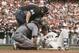San Francisco Giants' Buster Posey, right, is looked at by home plate umpire Fieldin Culbreth and Arizona Diamondbacks catcher Jeff Mathis after getting hit in the helmet by a fastball thrown by Diamondbacks starting pitcher Taijuan Walker in the first inning of a baseball game Monday, April 10, 2017, in San Francisco. Posey was forced to leave the game. (AP Photo/Eric Risberg)