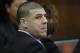 Former New England Patriots tight end Aaron Hernandez turns to look at assistant district attorney Patrick Haggan as Haggan questions a prosecution witness during Hernandez's double murder trial at Suffolk Superior Court Monday, April 3, 2017 in Boston. Hernandez is standing trial for the July 2012 killings of Daniel de Abreu and Safiro Furtado who he encountered in a Boston nightclub. The former NFL player is already serving a life sentence in the 2013 killing of semi-professional football player Odin Lloyd. (AP Photo/Stephan Savoia, Pool)
