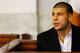 NORTH ATTLEBORO, MA - AUGUST 22: Aaron Hernandez sits in the courtroom of the Attleboro District Court during his hearing on August 22, 2013 in North Attleboro, Massachusetts. Former New England Patriot Aaron Hernandez has been indicted on a first-degree murder charge for the death of Odin Lloyd. (Photo by Jared Wickerham/Getty Images)
