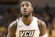 RICHMOND, VA - JANUARY 11: Mo Alie-Cox #12 of the Virginia Commonwealth Rams takes a foul shot during a college basketball game against the George Washington Colonials at the Siegel Center on January 11, 2017 in Richmond, Virginia. The Rams won 85-55. (Photo by Mitchell Layton/Getty Images)