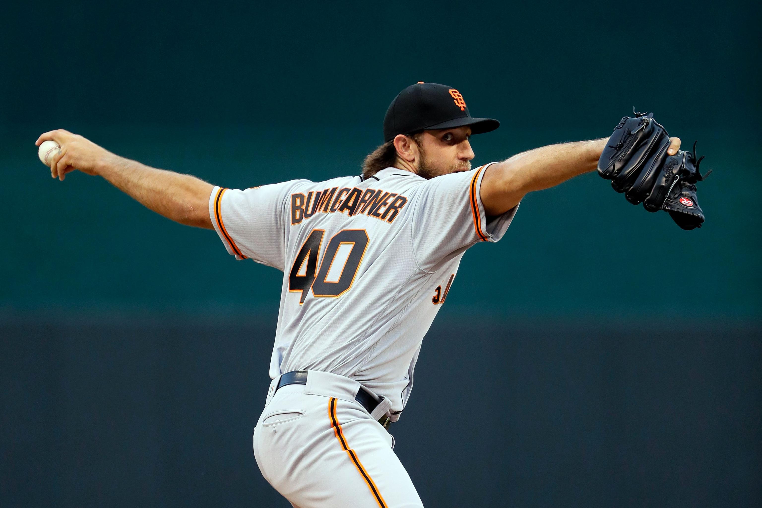 Giants' Madison Bumgarner dominates Rockies on the mound; also