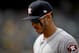 OAKLAND, CA - APRIL 15: Carlos Correa #1 of the Houston Astros looks on as he walks off the field against the Oakland Athletics at the end of the six inning at Oakland Alameda Coliseum on April 15, 2017 in Oakland, California. All players are wearing #42 in honor of Jackie Robinson Day. (Photo by Thearon W. Henderson/Getty Images)