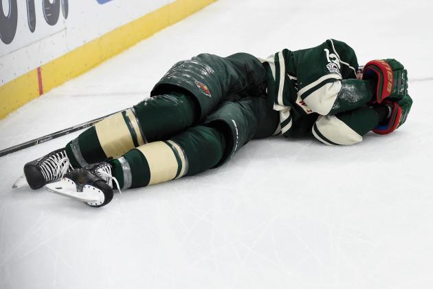 ST PAUL, MN - APRIL 22: Eric Staal #12 of the Minnesota Wild lays on the ice after hitting the boards against the St. Louis Blues during the second period in Game Five of the Western Conference First Round during the 2017 NHL Stanley Cup Playoffs at Xcel Energy Center on April 14, 2017 in St Paul, Minnesota. (Photo by Hannah Foslien/Getty Images)