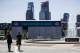 People walk from the Philadelphia Museum of Art as construction continues on the museum's steps for the upcoming 2017 NFL football draft in Philadelphia, Tuesday, April 18, 2017. (AP Photo/Matt Rourke)