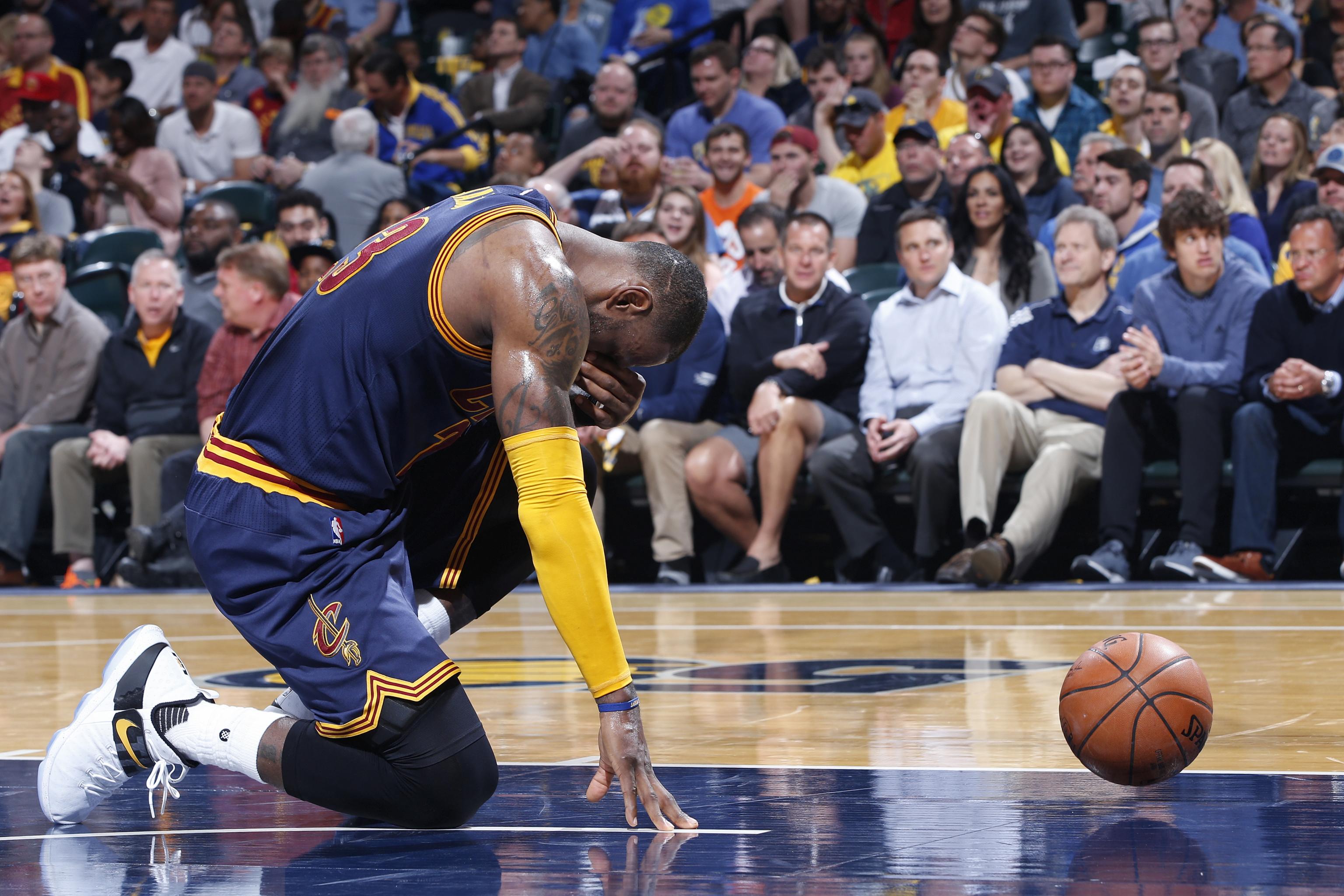 NBA playoffs: James helps Cavs hold off Pacers, earn sweep into