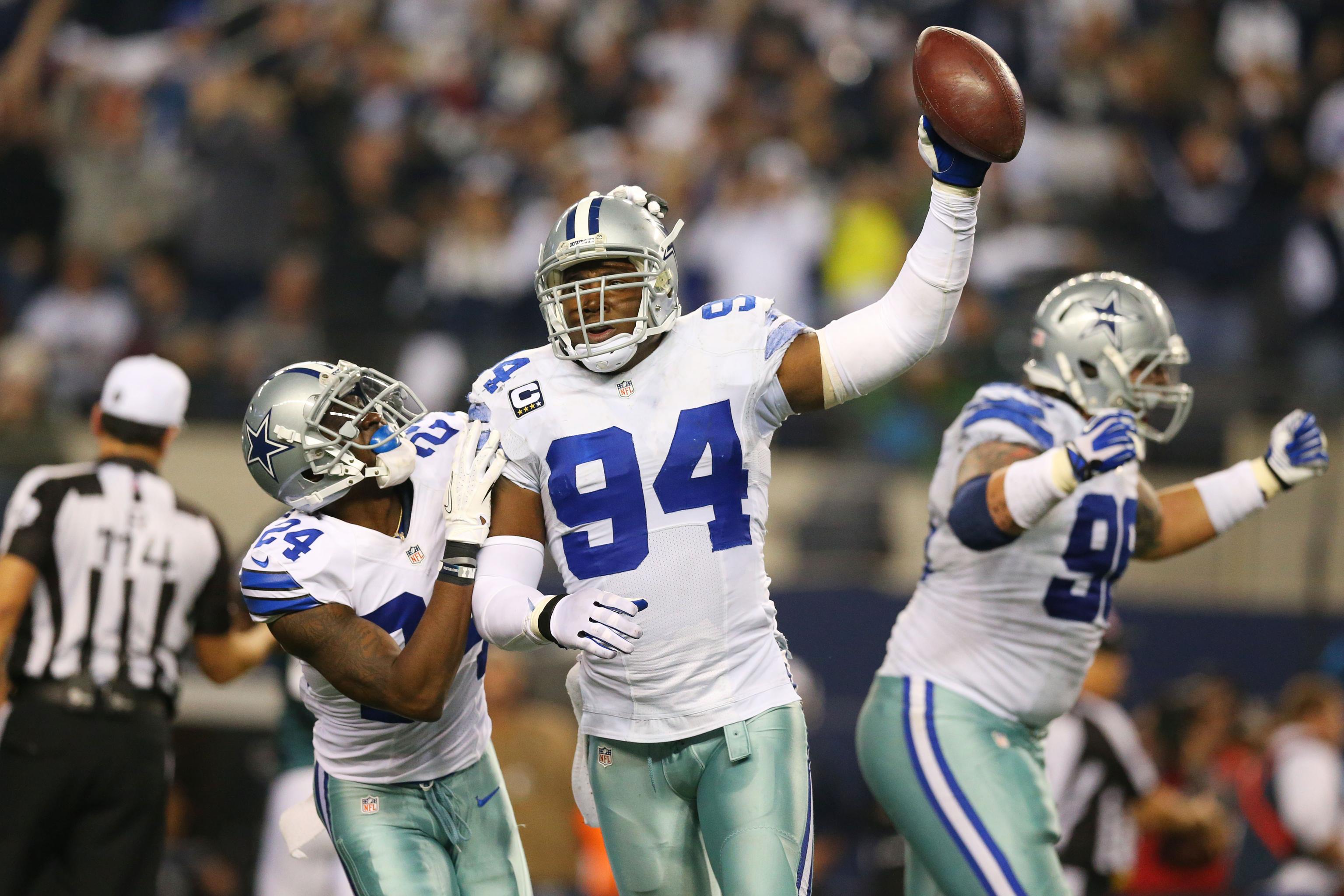 Cowboys great DeMarcus Ware celebrates retirement of No. 94 jersey at Troy