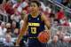 LAS VEGAS, NV - MARCH 09: Charlie Moore #13 of the California Golden Bears brings the ball up the court against the Utah Utes during a quarterfinal game of the Pac-12 Basketball Tournament at T-Mobile Arena on March 9, 2017 in Las Vegas, Nevada. California won 78-75. (Photo by Ethan Miller/Getty Images)