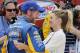Dale Earnhardt Jr. ,left, gets a hug from his fiancee Amy Reimann as he celebrates winning the Xfinity series auto race at Richmond International Raceway in Richmond, Va., Saturday, April 23, 2016. (AP Photo/Steve Helber)