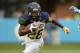 CHAPEL HILL, NC - SEPTEMBER 12: Tarik Cohen #28 of the North Carolina A&T Aggies runs against Dajaun Drennon #17 of the North Carolina Tar Heels during a game at Kenan Stadium on September 12, 2015 in Chapel Hill, North Carolina. (Photo by Grant Halverson/Getty Images)