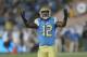 PASADENA, CA - SEPTEMBER 10: Linebacker Jayon Brown #12 of the UCLA Bruins exhorts the crowd in the game against the UNLV Rebels at the Rose Bowl on September 10, 2016 in Pasadena, California. (Photo by Stephen Dunn/Getty Images)