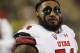 Utah Utes offensive lineman Isaac Asiata (54) warms up before an NCAA college football game Saturday, Nov. 26, 2016, in Boulder, Colo. Colorado won 27-22. (AP Photo/David Zalubowski)