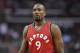Toronto Raptors forward Serge Ibaka (9), of Congo, looks on during the first half of an NBA basketball game against the Washington Wizards, Friday, March 3, 2017, in Washington. (AP Photo/Nick Wass)