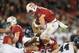 PALO ALTO, CA - NOVEMBER 26: Christian McCaffrey #5 of the Stanford Cardinal leaps over the line for a three yard gain and a first down against the Rice Owls in the first quarter of their NCAA football game at Stanford Stadium on November 26, 2016 in Palo Alto, California. (Photo by Thearon W. Henderson/Getty Images)