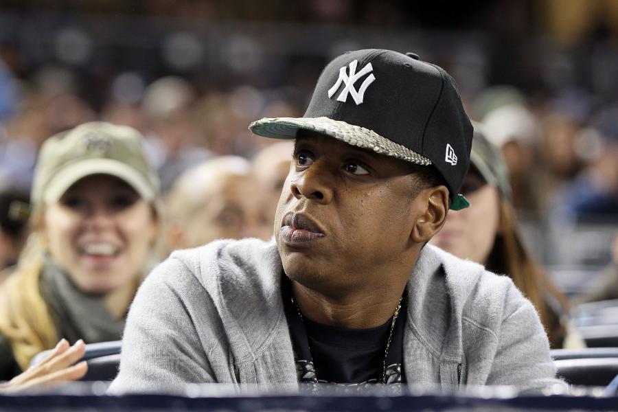 Jay Z sports controversial baseball cap as he alludes to his