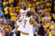 CLEVELAND, OH - MAY 1: LeBron James #23 celebrates with Kyrie Irving #2 and Kevin Love #0 of the Cleveland Cavaliers after scoring during the first half of Game One of the NBA Eastern Conference semifinals against the Toronto Raptors at Quicken Loans Arena on May 1, 2017 in Cleveland, Ohio. NOTE TO USER: User expressly acknowledges and agrees that, by downloading and or using this photograph, User is consenting to the terms and conditions of the Getty Images License Agreement. (Photo by Jason Miller/Getty Images)