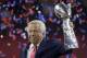 New England Patriots owner Robert Kraft raises the the Vince Lombardi Trophy after his team defeated the Atlanta Falcons in overtime at the NFL Super Bowl 51 football game Sunday, Feb. 5, 2017, in Houston. The Patriots defeated the Falcons 34-28. (AP Photo/Matt Slocum)