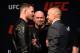 LAS VEGAS, NV - MARCH 03: (L-R) UFC middleweight champion Michael Bisping of England faces off against Georges St-Pierre of Canada during the UFC press conference at T-Mobile arena on March 3, 2017 in Las Vegas, Nevada. (Photo by Josh Hedges/Zuffa LLC/Zuffa LLC via Getty Images)
