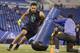 Youngstown defensive end Derek Rivers runs a drill at the NFL football scouting combine in Indianapolis, Sunday, March 5, 2017. (AP Photo/Michael Conroy)