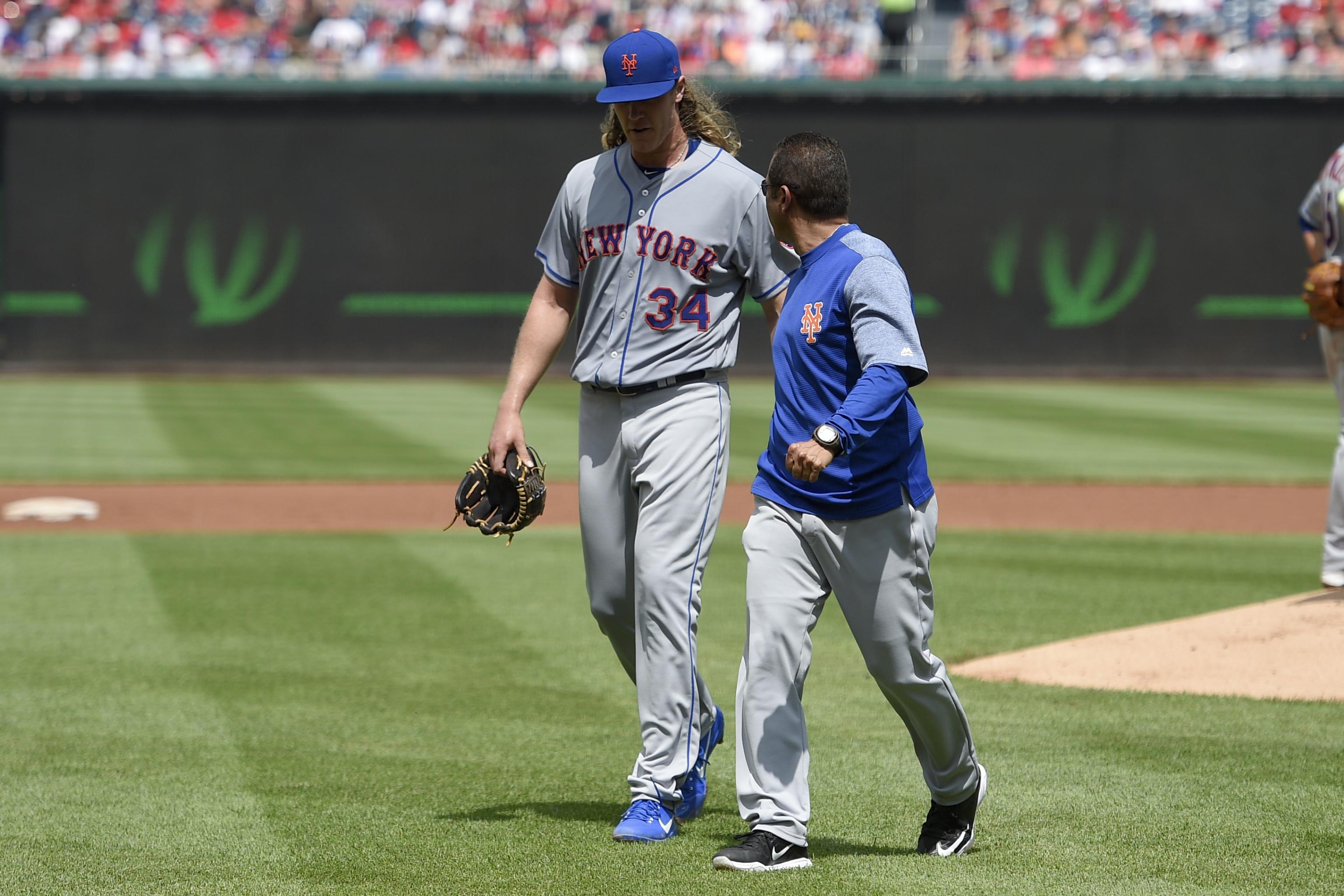 Noah Syndergaard was having a good Guardians debut but had to exit with  trainers after taking a comebacker to the leg