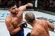 FORTALEZA, BRAZIL - MARCH 11: (L-R) Kelvin Gastelum punches Vitor Belfort of Brazil in their middleweight bout during the UFC Fight Night event at CFO - Centro de Formaco Olimpica on March 11, 2017 in Fortaleza, Brazil. (Photo by Buda Mendes/Zuffa LLC/Zuffa LLC via Getty Images)