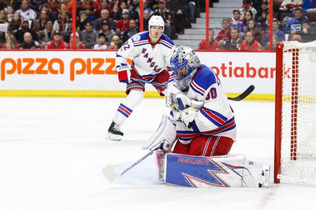 OTTAWA, ON - MAY 6:  Henrik Lundqvist #30 of the New York Rangers has the puck go under his throat guard as he makes a save and teammate Nick Holden #22 looks on in overtime in Game Five of the Eastern Conference Second Round during the 2017 NHL Stanley Cup Playoffs at Canadian Tire Centre on May 6, 2017 in Ottawa, Ontario, Canada.  (Photo by Jana Chytilova/Freestyle Photography/Getty Images) *** Local Caption ***