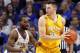 Kentucky's Dominique Hawkins, left, defends Valparaiso's Alec Peters during the second half of an NCAA college basketball game, Wednesday, Dec. 7, 2016, in Lexington, Ky. Kentucky won 87-63.(AP Photo/James Crisp)
