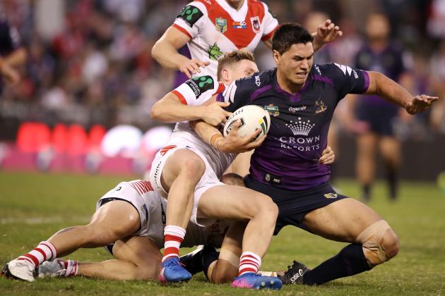 WOLLONGONG, AUSTRALIA - APRIL 30: Jordan McLean of the Storm is tackled during the round nine NRL match between the St George Illawarra Dragons and the Melbourne Storm at WIN Stadium on April 30, 2017 in Wollongong, Australia.  (Photo by Mark Kolbe/Getty Images)