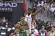 Boston Celtics guard Isaiah Thomas (4) handles the ball against Washington Wizards guard John Wall (2) during the first half in Game 4 of a second-round NBA basketball playoff series, Sunday, May 7, 2017, in Washington. (AP Photo/Nick Wass)