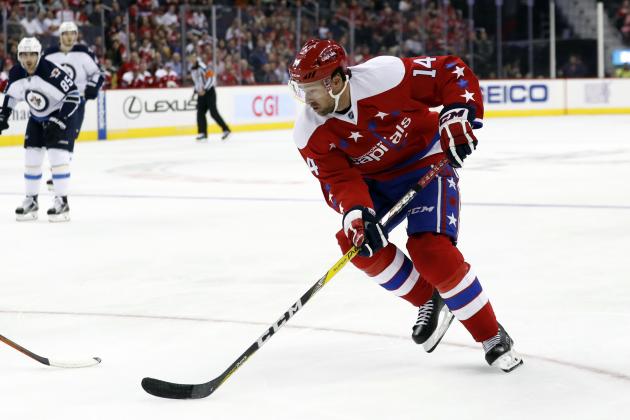 Washington Capitals right wing Justin Williams (14) skates with the puck in the first period of an NHL hockey game against the Winnipeg Jets, Thursday, Nov. 3, 2016, in Washington. (AP Photo/Alex Brandon)