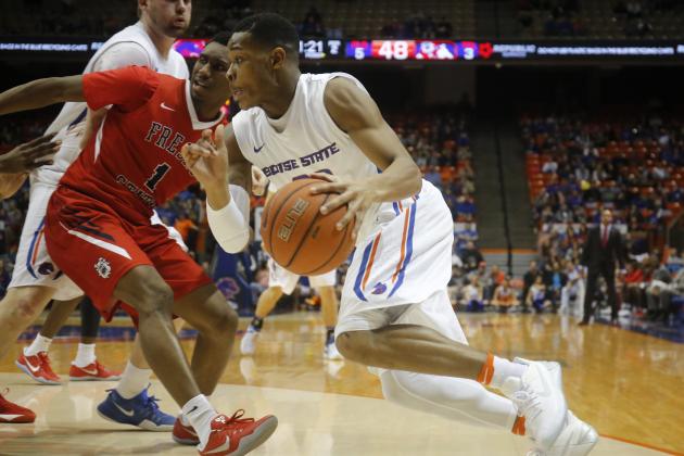 Boise State's Paris Austin moves the ball past Fresno State's Jaron Hopkins (1) during the second half of an NCAA college basketball game in Boise, Idaho, Tuesday, Feb. 28, 2017. Fresno State won 74-67. (AP Photo/Otto Kitsinger)