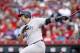 CINCINNATI, OH - MAY 08: Gary Sanchez #24 of the New York Yankees singles to left to drive in two runs against the Cincinnati Reds in the first inning of a game at Great American Ball Park on May 8, 2017 in Cincinnati, Ohio. (Photo by Joe Robbins/Getty Images)