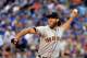 KANSAS CITY, MO - APRIL 19: Starting pitcher Madison Bumgarner #40 of the San Francisco Giants pitches during the 1st inning of the game against the Kansas City Royals at Kauffman Stadium on April 19, 2017 in Kansas City, Missouri. (Photo by Jamie Squire/Getty Images)