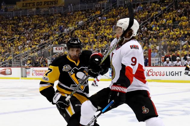 PITTSBURGH, PA - MAY 13:  Matt Cullen #7 of the Pittsburgh Penguins hits Bobby Ryan #9 of the Ottawa Senators in the face with his stick during the first period in Game One of the Eastern Conference Final during the 2017 NHL Stanley Cup Playoffs at PPG PAINTS Arena on May 13, 2017 in Pittsburgh, Pennsylvania.  (Photo by Bruce Bennett/Getty Images)