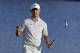 Si Woo Kim, of South Korea, celebrates after winning The Players Championship golf tournament Sunday, May 14, 2017, in Ponte Vedra Beach, Fla. (AP Photo/Chris O'Meara)