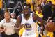 OAKLAND, CA - MAY 14: Draymond Green #23 of the Golden State Warriors handles the ball against the San Antonio Spurs in Game One of the Western Conference Finals of the 2017 NBA Playoffs on May 14, 2017 at ORACLE Arena in Oakland, California. NOTE TO USER: User expressly acknowledges and agrees that, by downloading and/or using this Photograph, user is consenting to the terms and conditions of the Getty Images License Agreement. Mandatory Copyright Notice: Copyright 2017 NBAE (Photo by Andrew D. Bernstein/NBAE via Getty Images)