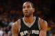 OAKLAND, CA - MAY 14: Kawhi Leonard #2 of the San Antonio Spurs shoots the ball against the Golden State Warriors in Game One of the Western Conference Finals of the 2017 NBA Playoffs on May 14, 2017 at ORACLE Arena in Oakland, California. NOTE TO USER: User expressly acknowledges and agrees that, by downloading and/or using this Photograph, user is consenting to the terms and conditions of the Getty Images License Agreement. Mandatory Copyright Notice: Copyright 2017 NBAE (Photo by Andrew D. Bernstein/NBAE via Getty Images)