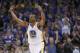 FILE - In this April 4, 2017, file photo, Golden State Warriors forward Andre Iguodala celebrates a 3-point shot against the Minnesota Timberwolves during the first half of an NBA basketball game in Oakland, Calif. Iguodala is part of