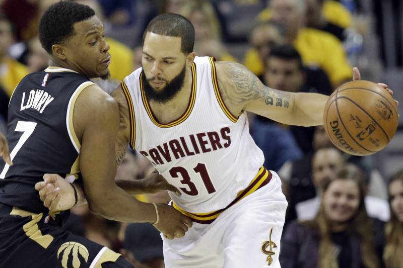 Cleveland Cavaliers' Deron Williams (31) drives past Toronto Raptors' Kyle Lowry (7) in the first half in Game 2 of a second-round NBA basketball playoff series, Wednesday, May 3, 2017, in Cleveland. (AP Photo/Tony Dejak)