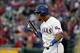 Texas Rangers' Carlos Gomez prepares for an at-bat against the Kansas City Royals in a baseball game in Arlington, Texas, Saturday, April 22, 2017. (AP Photo/Tony Gutierrez)