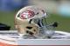 A san Francisco 49ers helmet sits in the bench area against the Carolina Panthers during the second half of an NFL football game in Charlotte, N.C., Sunday, Sept. 18, 2016. The Panthers won 46-27. (AP Photo/Bob Leverone)