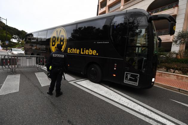 The bus transporting Dortmund's players arrives under poice escort
at the Louis II stadium prior to the UEFA Champions League football match Monaco vs Dortmund on April 19 in Monaco.  / AFP PHOTO / boris HORVAT        (Photo credit should read BORIS HORVAT/AFP/Getty Images)