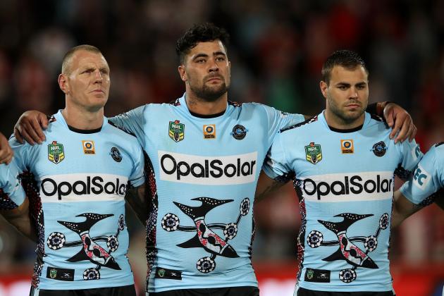 SYDNEY, NEW SOUTH WALES - MAY 12:  Luke Lewis, Andrew Fifita and Wade Graham of the Sharks stand for the national anthem before the round 10 NRL match between the St George Illawarra Dragons and the Cronulla Sharks at UOW Jubilee Oval on May 12, 2017 in Sydney, Australia.  (Photo by Mark Kolbe/Getty Images)
