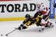 Pittsburgh Penguins' Matt Cullen (7) dives for the puck as Ottawa Senators' Jean-Gabriel Pageau (44) defends during the third period of Game 2 of the Eastern Conference final in the NHL hockey Stanley Cup playoffs, Monday, May 15, 2017, in Pittsburgh. The Penguins won 1-0. (AP Photo/Gene J.Puskar)