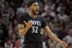 Minnesota Timberwolves center Karl-Anthony Towns reacts to an official's call during the second half of the team's NBA basketball game against the Portland Trail Blazers in Portland, Ore., Thursday, April 6, 2017. The Blazers won 105-98. (AP Photo/Steve Dykes)